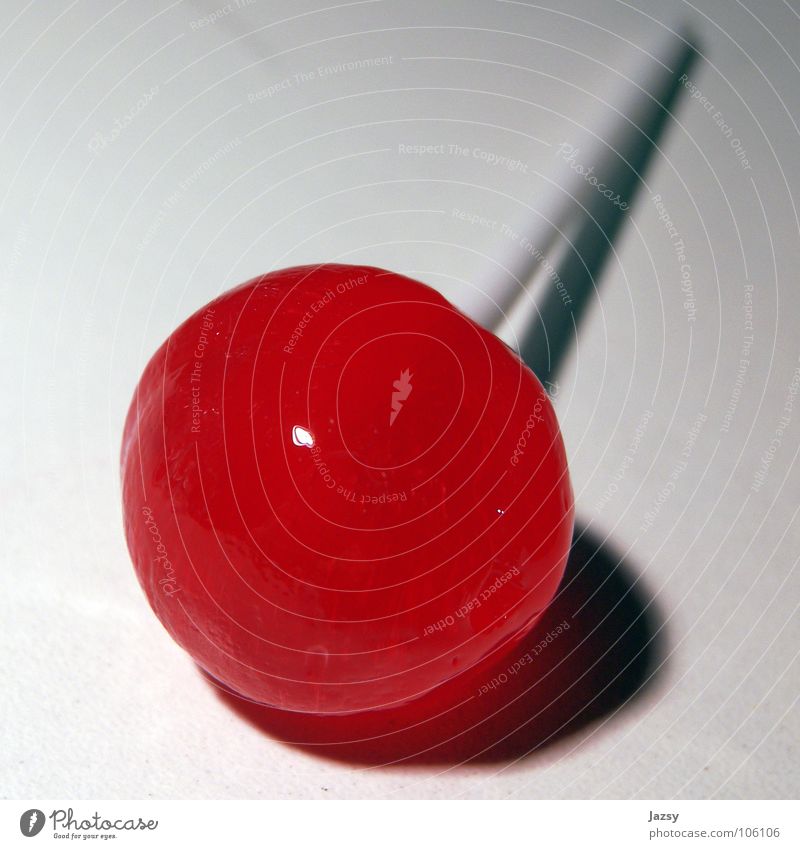 ein williger lollipop Lollipop lutschen rot weiß süß Süßwaren loli Farbe loly