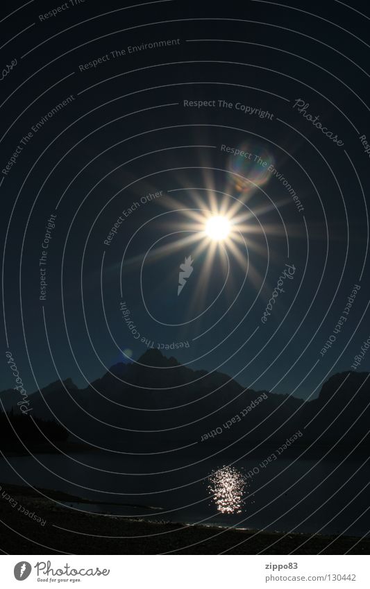 Sonne mit Bergen See dunkel Physik Herbst Himmelskörper & Weltall Berge u. Gebirge Spieglung Wärme Yellowstone Nationalpark