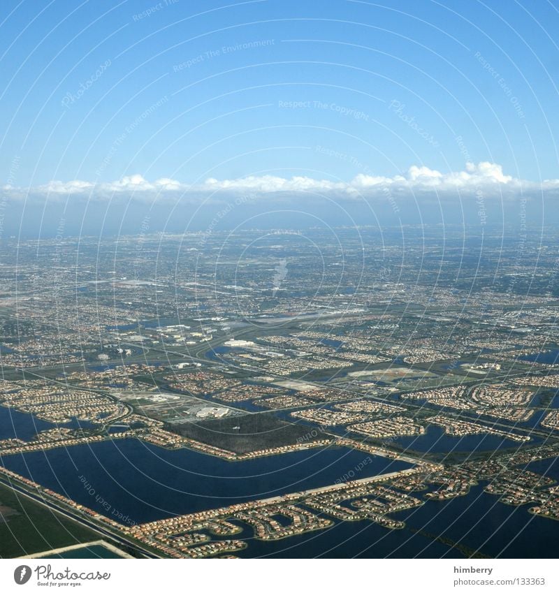 maverick Stadt Miami Infrastruktur Wohnsiedlung bebauen Flugzeug Himmel Wolken Verkehrswege USA Straße Netz strassennetz besiedelung Strukturen & Formen sky