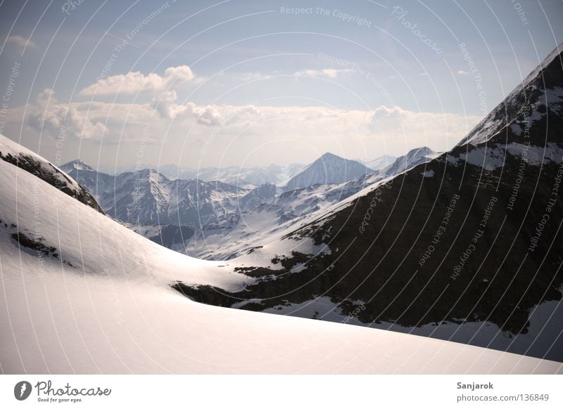 Fernweh! Österreich Großglockner Gipfel Aussicht Durchblick Wolken Gletscher Winter hoch Hochgebirge Berge u. Gebirge Schnee Felsen Blauer Himmel Freiheit