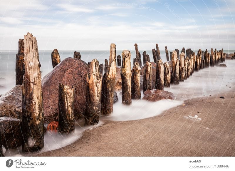 Buhne an der Ostsee Erholung Ferien & Urlaub & Reisen Strand Meer Wellen Natur Landschaft Wasser Wolken Küste Stein Holz blau Romantik Idylle ruhig Tourismus