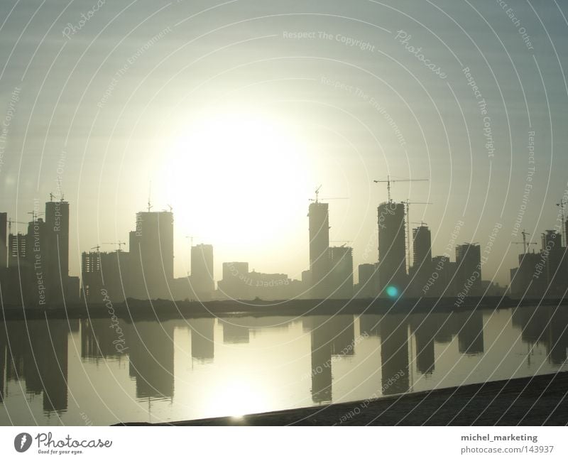 Dubai Kran Hochhaus Wasser Sonnenuntergang Naher und Mittlerer Osten Reflexion & Spiegelung Architektur