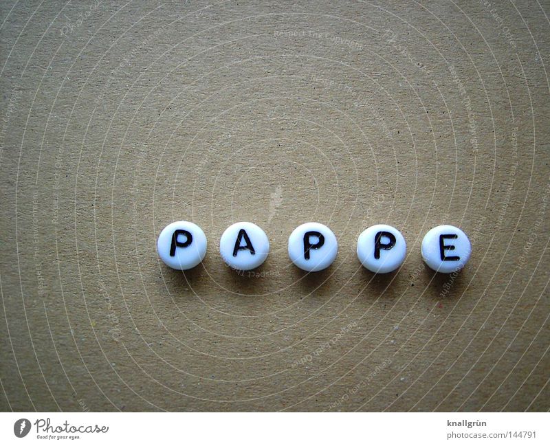 PAPPE Buchstaben Wort weiß schwarz braun rund Material Karton obskur Schriftzeichen Perle Letter