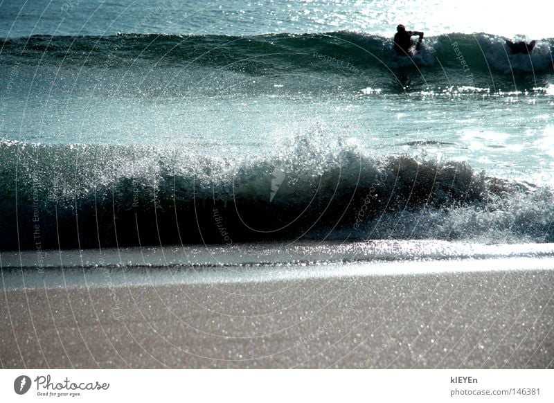 Gischt Wellen Wasser Sand Strand Surfer Sonne Wassertropfen Reflexion & Spiegelung Meer