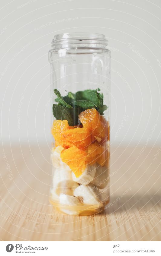Smoothie Lebensmittel Frucht Orange Minze Vegetarische Ernährung Diät Getränk Erfrischungsgetränk Milchshake Becher Gesundheit Gesunde Ernährung Wohnung Tisch