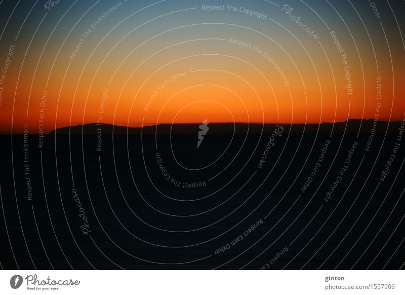 Farbenfroher Sonnenuntergang schön Meer Berge u. Gebirge Natur Horizont Wetter Küste Strand Pazifik dunkel gelb orange rot schwarz Unschärfe Tageszeit Himmel