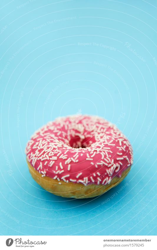 Donut Kunst Kunstwerk ästhetisch Krapfen süß Süßwaren Süßwarengeschäft Süßwarenstand Zucker lecker rosa Streusel blau Komplementärfarbe Kontrast