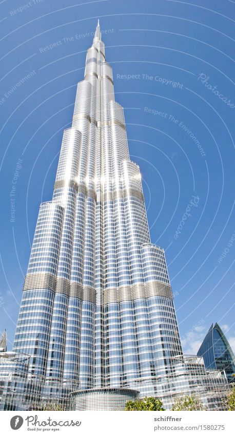 Babel again Haus Hochhaus Bauwerk Gebäude Architektur Sehenswürdigkeit Wahrzeichen groß hoch blau silber Burj Khalifa Turm Himmel Wolkenloser Himmel Dubai