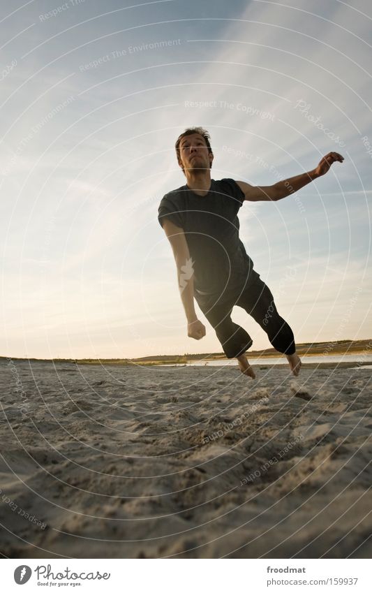 rettungsspringer Silhouette Sand Ball Gegenlicht Jugendliche Coolness Wärme sportlich Spielen Sonnenuntergang Volleyball springen Mann Barfuß Spannung Freude