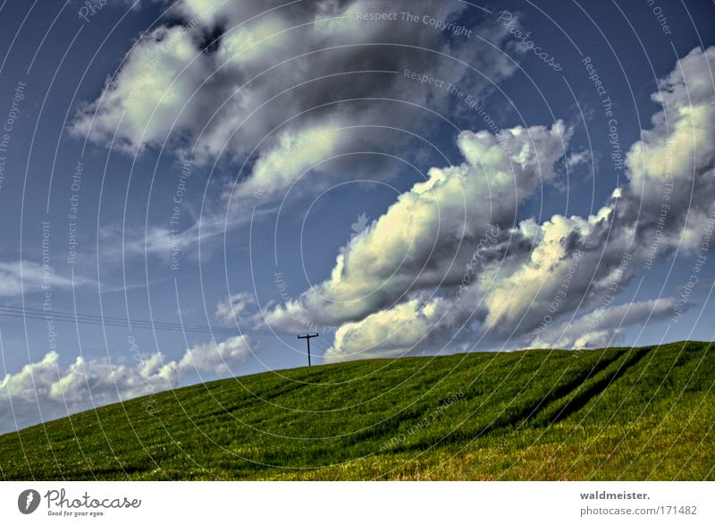 Landschaft Natur Himmel Wolken Hügel Feld Ackerbau Landwirtschaft ruhig Erholung Ferien & Urlaub & Reisen grün blau Textfreiraum Mecklenburg-Vorpommern