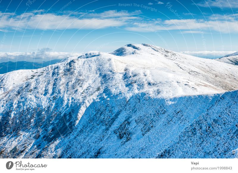 Weiße Gipfel der Berge im Schnee Ferien & Urlaub & Reisen Tourismus Sonne Winter Winterurlaub Berge u. Gebirge wandern Natur Landschaft Himmel Wolken