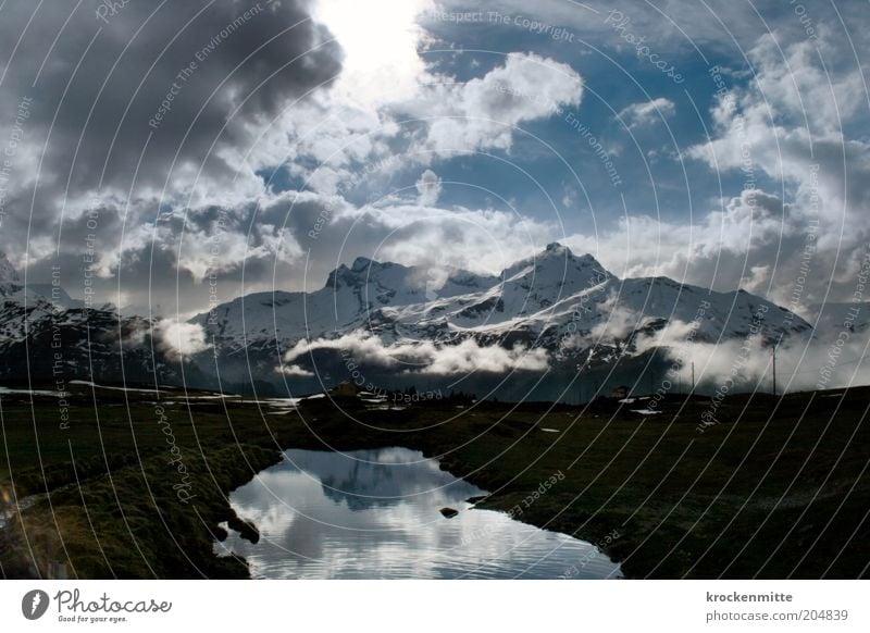 Alprausch Natur Landschaft Wasser Himmel Wolken Gewitterwolken Sonnenaufgang Sonnenuntergang Sonnenlicht Winter schlechtes Wetter Alpen Berge u. Gebirge Gipfel