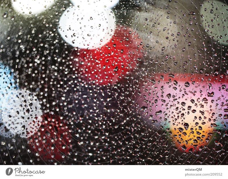 I love Friday's. ästhetisch Regen Scheibe nass Unschärfe Licht Lichtermeer fluoreszierend Lichtpunkt Punkt Nachtaufnahme Wassertropfen Wetter Farbfoto