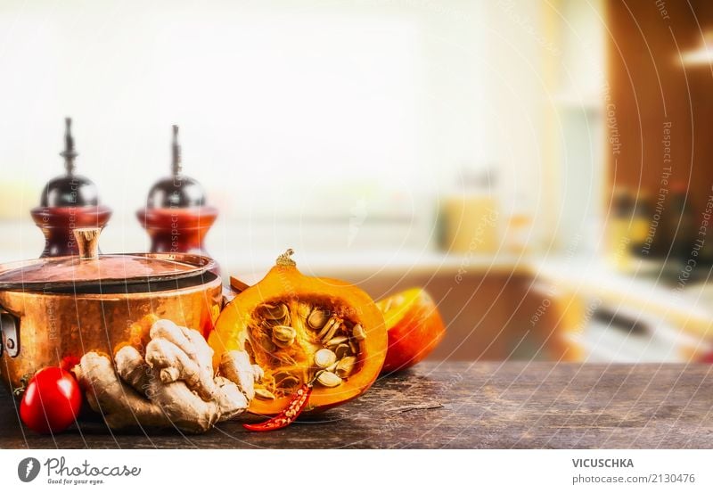 Kürbis und Topf auf Küchentisch Lebensmittel Gemüse Kräuter & Gewürze Ernährung Bioprodukte Vegetarische Ernährung Diät Stil Design Gesunde Ernährung