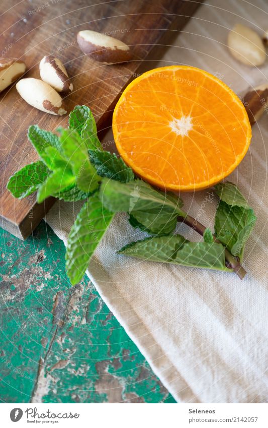 Orange und Minze Frühstück Obst orange Nuss Frucht Gesundheit Lebensmittel Ernährung lecker frisch Gesunde Ernährung Vegetarische Ernährung Bioprodukte Farbfoto