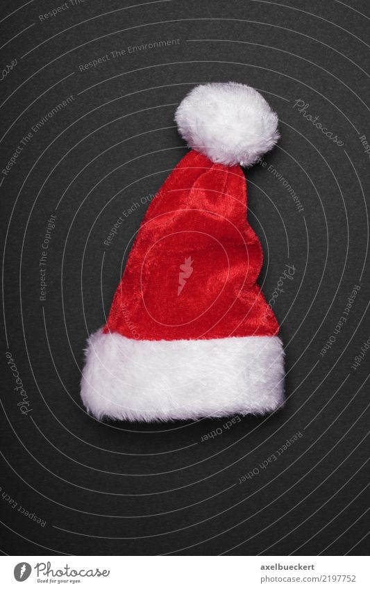 Weihnachtsmannmütze Design Feste & Feiern Weihnachten & Advent Mütze rot schwarz weiß Tradition Weihnachtsdekoration Nikolausmütze Vor dunklem Hintergrund