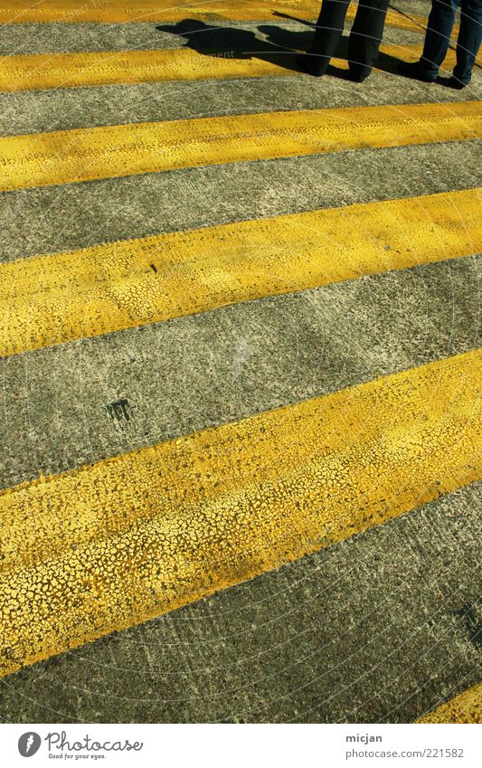 In an infinite World | Why don't we stop here? Beine Verkehrswege Fußgänger stehen warten bedrohlich trist Zebrastreifen gelb Straßenbelag Asphalt Farbe