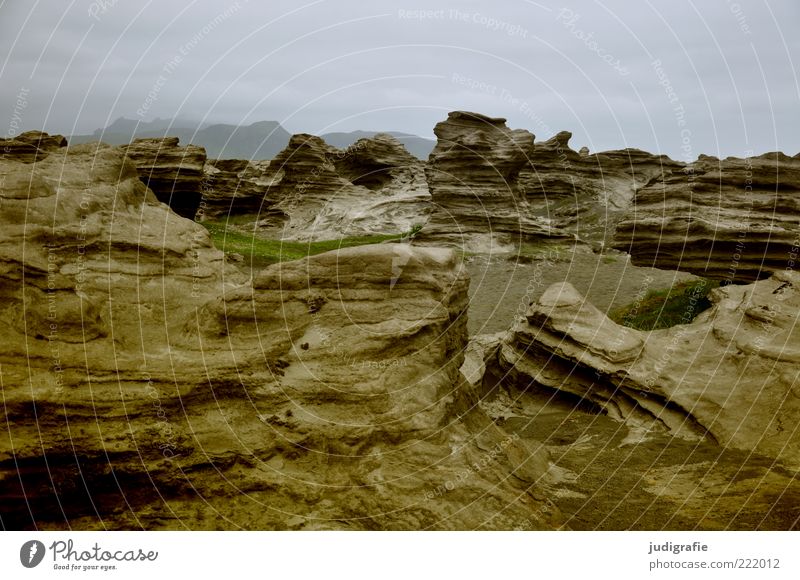 Island Umwelt Natur Landschaft Erde Himmel Felsen außergewöhnlich dunkel natürlich wild Stimmung Gesteinsformationen Stein Strukturen & Formen Farbfoto