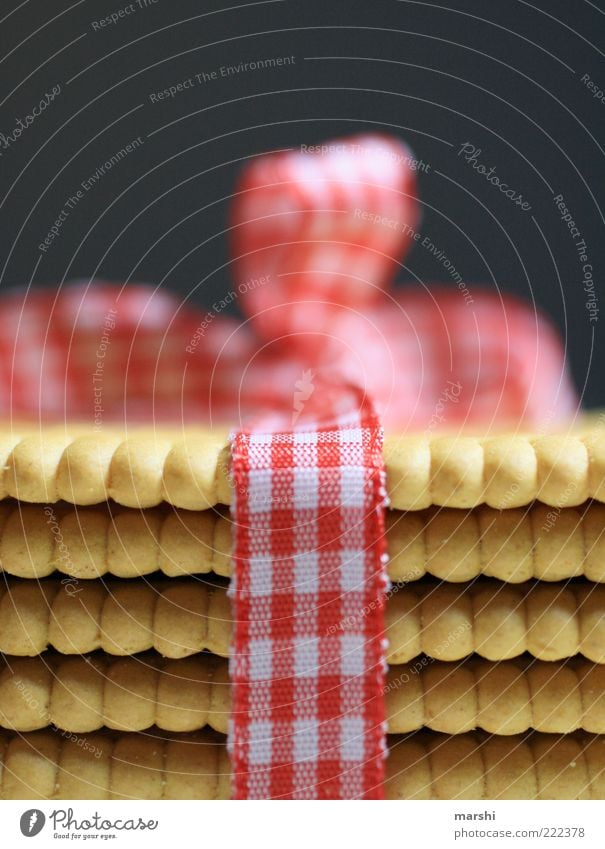 süßes Paket Lebensmittel Dessert Süßwaren Ernährung gold rot weiß Keks Butterkeks Schleife Geschenk Verpackung Unschärfe Strukturen & Formen lecker schenken
