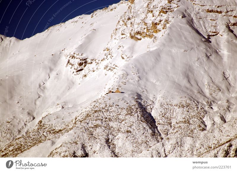 Winterbeginn im Hochgebirge Landschaft Schönes Wetter Schnee Felsen Alpen Berge u. Gebirge Farbfoto Außenaufnahme Menschenleer Tag Totale Berghang