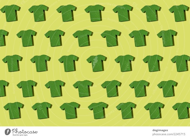 Grünes T-Shirt wiederholtes Muster Stil Mode Bekleidung Hemd Stoff Sammlung grün weiß Farbe Stapel Hemden Anhäufung Wiederholung Miniatur farbenfroh Hintergrund