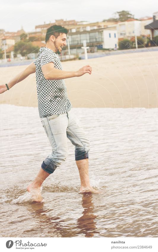 Junger Mann Genießt Den Tag Am Strand Ein Lizenzfreies Stock Foto Von Photocase