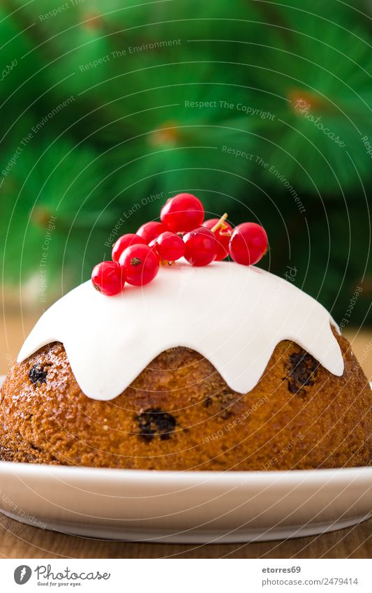 Weihnachtspudding auf Holztisch Pudding Weihnachten & Advent Lebensmittel Gesunde Ernährung Foodfotografie Dessert Tradition süß Bonbon gebastelt Jahreszeiten