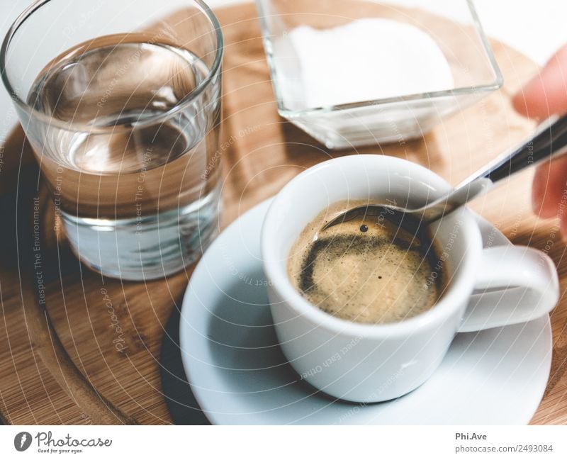 Espresso Genuss. Lebensmittel Zucker Ernährung Frühstück Mittagessen Kaffeetrinken Getränk Wasser heiß rühren Glas Farbfoto Gedeckte Farben Innenaufnahme