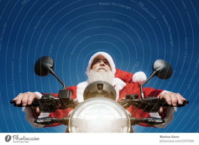Weihnachtsmann auf dem Motorrad Freude Winter Weihnachten & Advent Mensch maskulin Mann Erwachsene Bart 45-60 Jahre blau rot Motorradfahrer Hintergrundbild