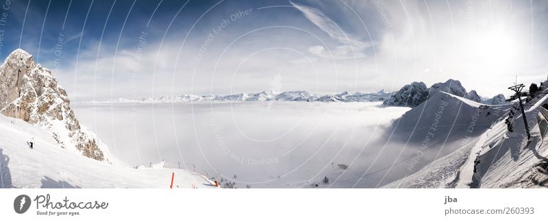 Nebelmeer von oben Leben Tourismus Winter Schnee Winterurlaub Berge u. Gebirge Wintersport Skifahren Skipiste Landschaft Himmel Wolken Sonne Felsen Alpen Gipfel