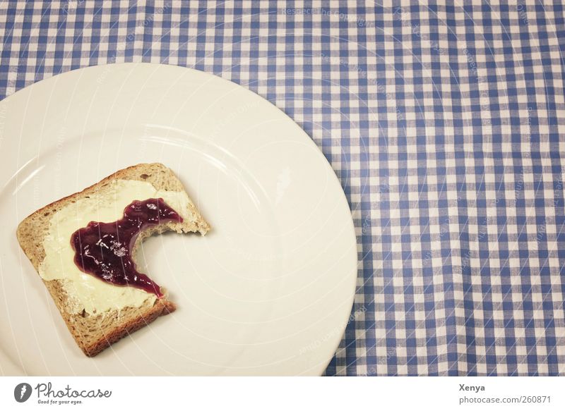 Angefressen Lebensmittel Brot Toastbrot Ernährung Frühstück Teller blau weiß Appetit & Hunger Enttäuschung Liebeskummer Tischwäsche kariert Trennung