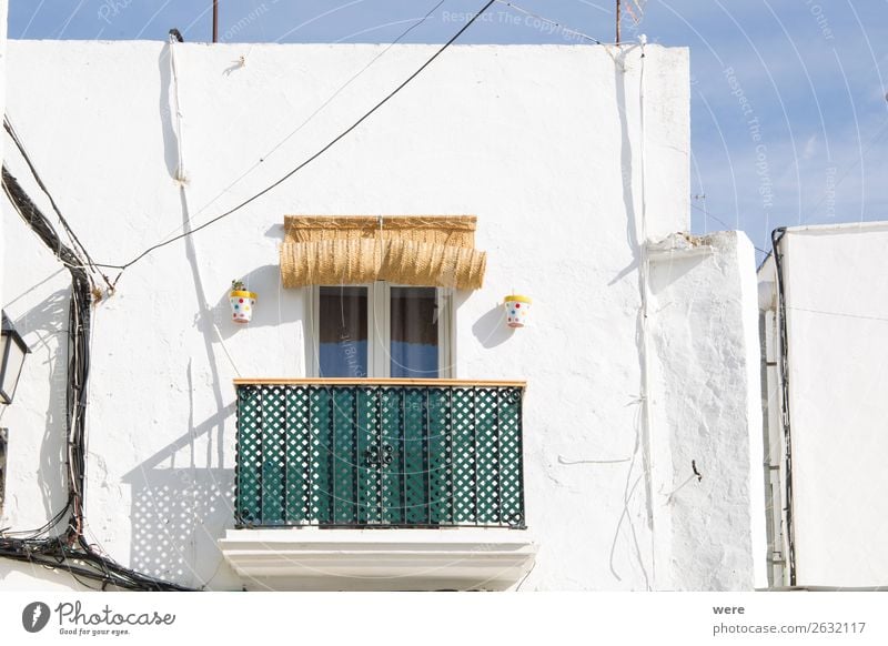 Facades of spanish houses Sommer Wohnung Hochhaus Fassade alt einzigartig Andalusia Balcony Green white striped Spain blinds Blauer Himmel building copy space
