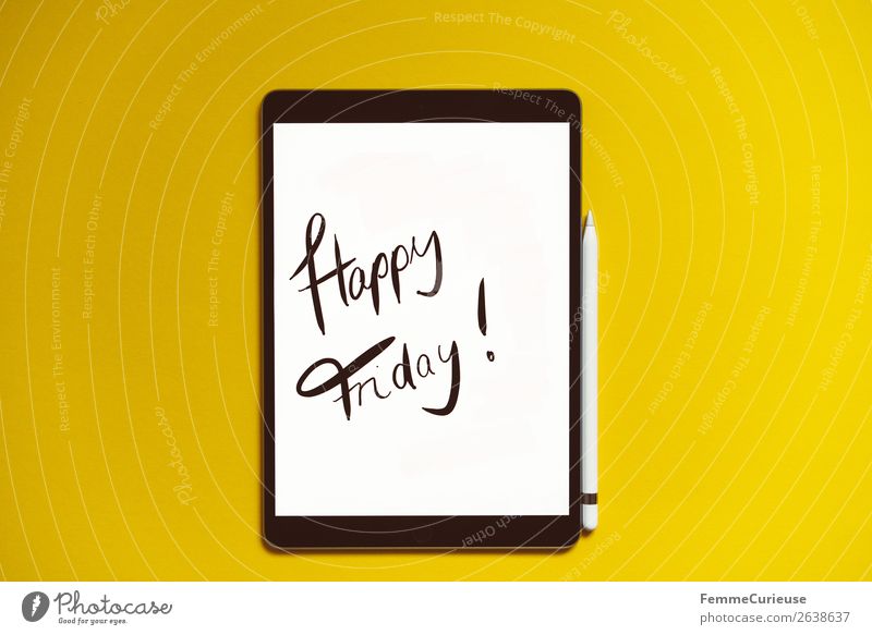 Tablet with a handwritten "Happy Friday!" on yellow background Technik & Technologie Unterhaltungselektronik Fortschritt Zukunft Schreibwaren Papier