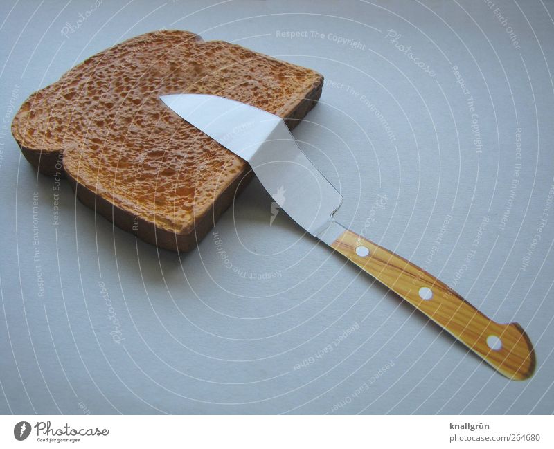 Angepasst Lebensmittel Teigwaren Backwaren Brot Toastbrot Ernährung Frühstück Abendessen Besteck Messer liegen außergewöhnlich braun grau Knick Farbfoto
