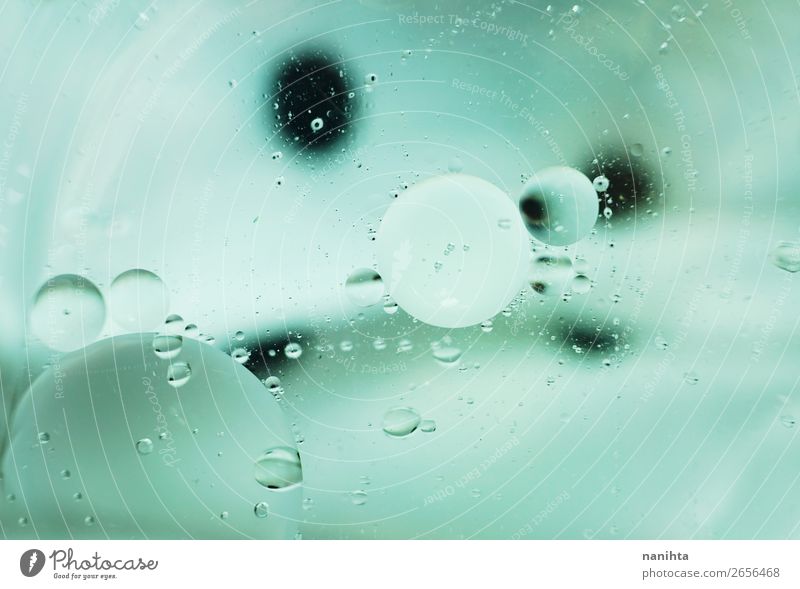 Ein schönes und lebendiges Makro von Ölblasen. Design Tapete Wasser Kugel Tropfen alt einfach hell klein grün schwarz weiß Farbe Kreativität Kunst rein