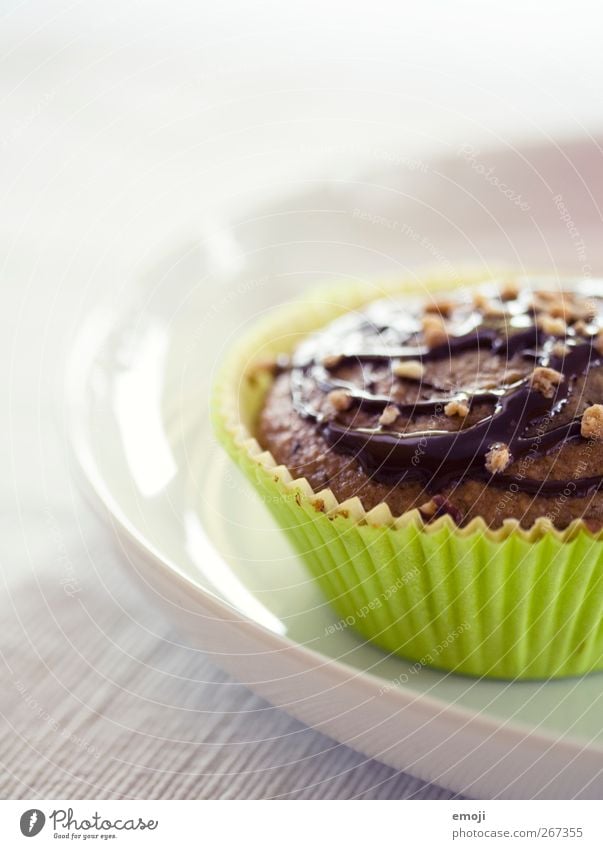 zum Wochenende Teigwaren Backwaren Dessert Süßwaren Schokolade Ernährung Fingerfood Teller lecker grün Muffin süß verziert Farbfoto Innenaufnahme Nahaufnahme