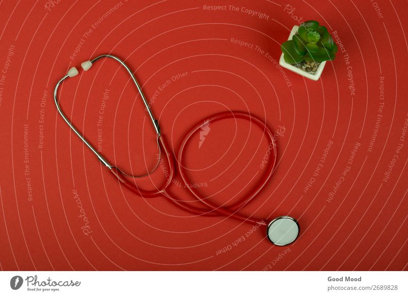 Draufsicht rotes Stethoskop auf rotem Papiergrund Gesundheitswesen Behandlung Krankheit Medikament Wellness Tisch Wissenschaften Prüfung & Examen Arzt