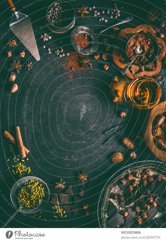 Schokolade Hintergrund mit Nüssen und Wintergewürze Lebensmittel Kräuter & Gewürze Ernährung Geschirr Stil Design Tisch Weihnachten & Advent Tradition