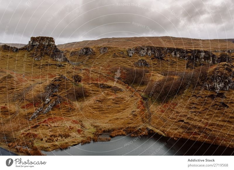 Hügel am Seeufer Küste Felsen Berge u. Gebirge Landschaft Natur Wasser natürlich Stein schön Wolken Schottland Gras Ferien & Urlaub & Reisen Klippe Aussicht