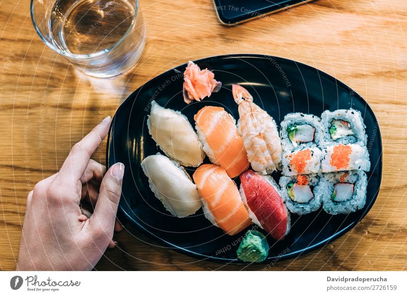 Getreidefrau Beim Sushi Essen Ein Lizenzfreies Stock Foto Von Photocase