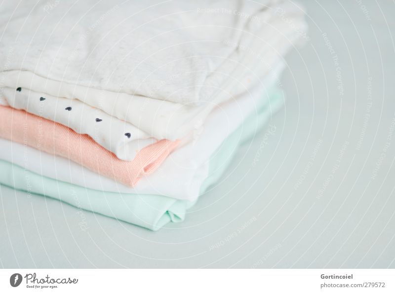 Textil Mode Bekleidung T-Shirt Hemd Stoff hell Sauberkeit Pastellton Bluse orange mint gewaschen Wäsche Stapel Textilien Baumwolle Seide weich Farbfoto