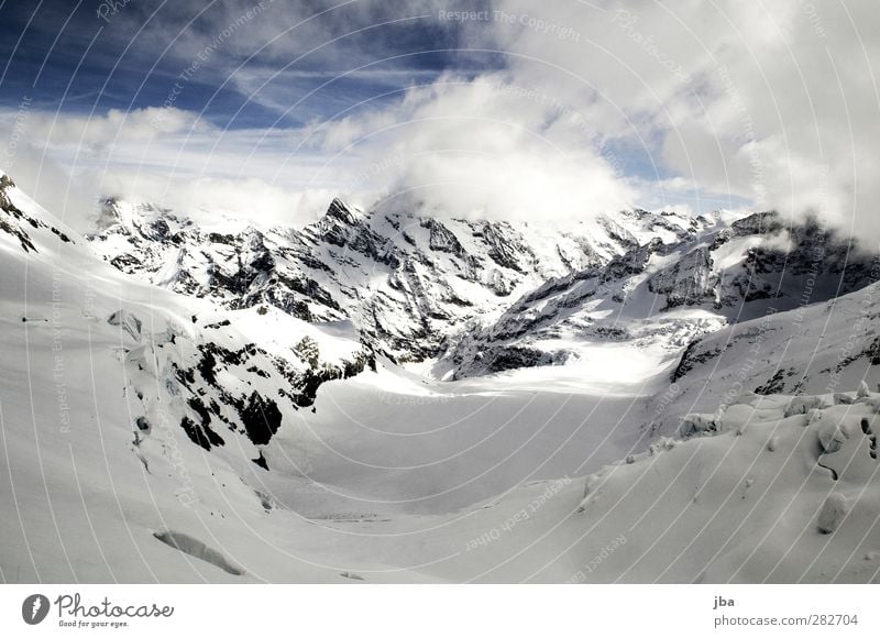 Gletscher Leben Tourismus Freiheit Winter Schnee Berge u. Gebirge Natur Landschaft Wolken Schönes Wetter Eis Frost Felsen Alpen Gipfel Schneebedeckte Gipfel