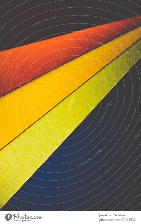 grafisches Hintergrundbild aus Buntpapier Basteln Kunst Papier einfach mehrfarbig gelb grün rot Rahmen flach Geometrie graphisch Entwurf minimalistisch orange