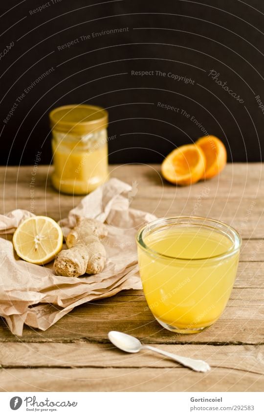 Zitrus-Ingwer-Tee Lebensmittel Orange Getränk Heißgetränk Glas Löffel frisch Gesundheit heiß lecker braun gelb schwarz Foodfotografie Honig Zitrone Erkältung