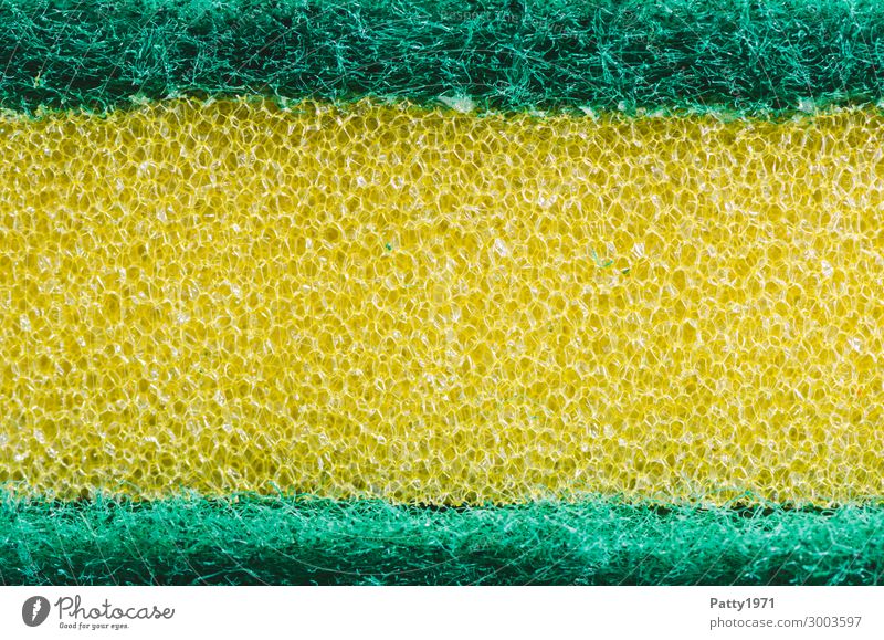 Küchenschwamm (Makro) Häusliches Leben Wohnung Bad Schwamm Oberflächenstruktur Kunststoff Sauberkeit gelb grün rein Reinigen Reinigungsmittel kratzig kraus