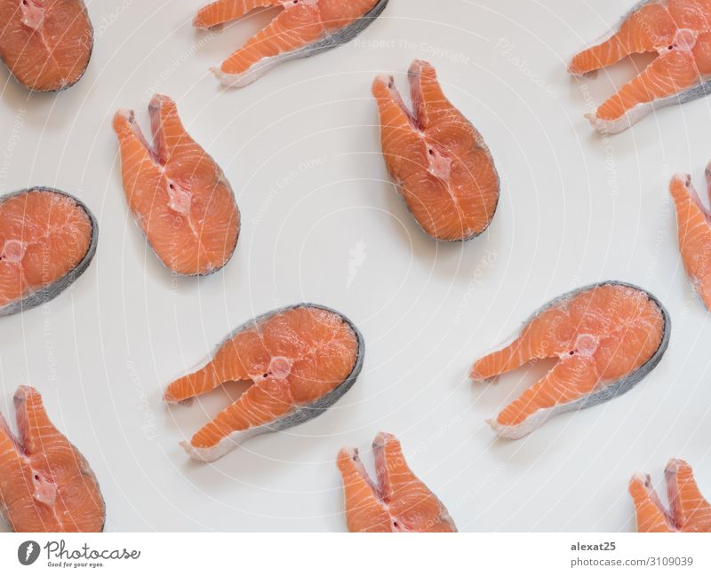 Lachssteakmuster auf weißem Hintergrund Meeresfrüchte frisch natürlich oben rot Entwurf Essen zubereiten Fett Fisch Lebensmittel Feinschmecker Gesundheit