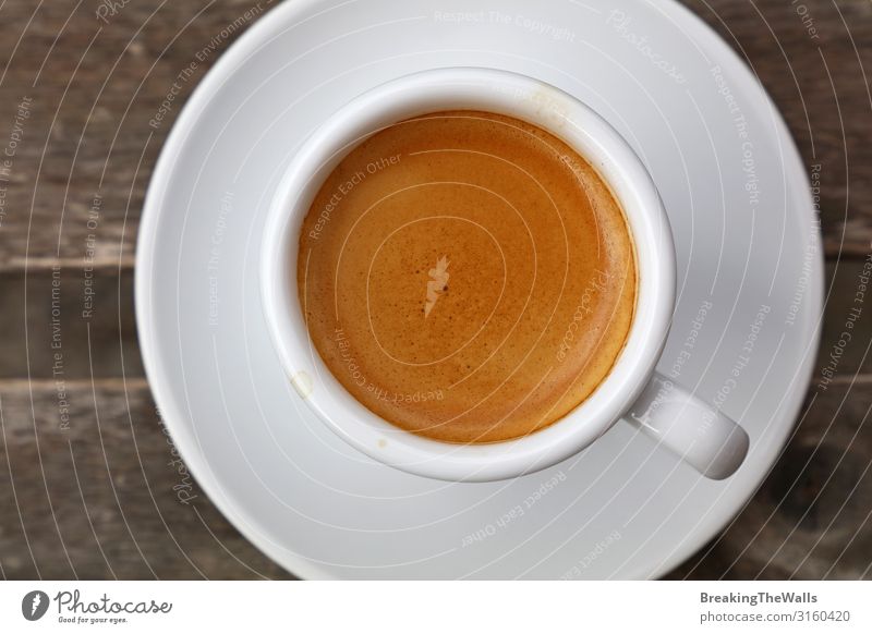 Fukk Tasse Espresso-Kaffee aus der Nähe Frühstück Kaffeetrinken Getränk Heißgetränk Becher Holz weiß Kaffeetasse Tisch Porzellan Untertasse Crema Kaffeepause