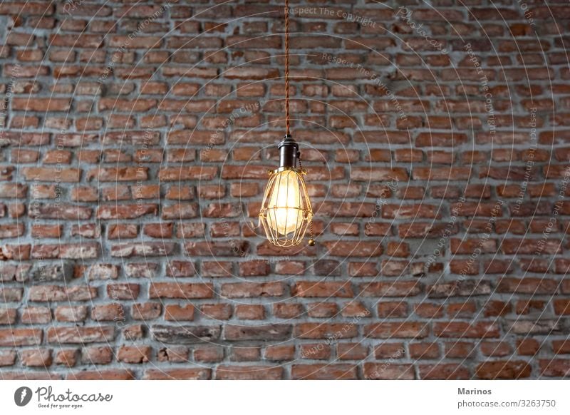 Leuchten an einer Wand mit Backsteinhintergrund. kaufen Reichtum Design Innenarchitektur Dekoration & Verzierung Lampe Industrieanlage Gebäude Architektur Licht