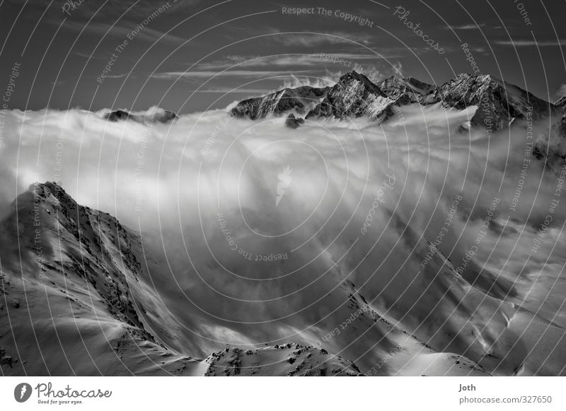 Wolkenstaudamm Landschaft Winter Wetter Schnee Alpen Berge u. Gebirge Schneebedeckte Gipfel Unendlichkeit Klima Schwarzweißfoto Außenaufnahme Tag Schatten