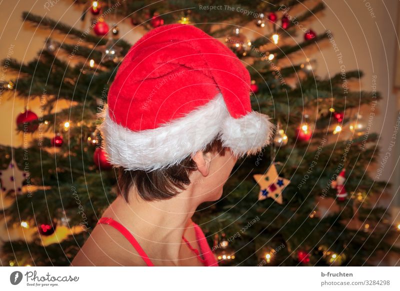 Weihnachtszeit Party Veranstaltung Feste & Feiern Weihnachten & Advent Silvester u. Neujahr Frau Erwachsene Haut Kopf 1 Mensch Mütze kurzhaarig Zeichen Blick